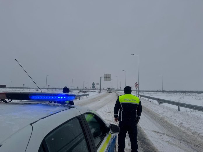 politie drum zapada iarna